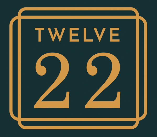 A graphic with the number 12 and the word "TWELVE" in a golden frame.